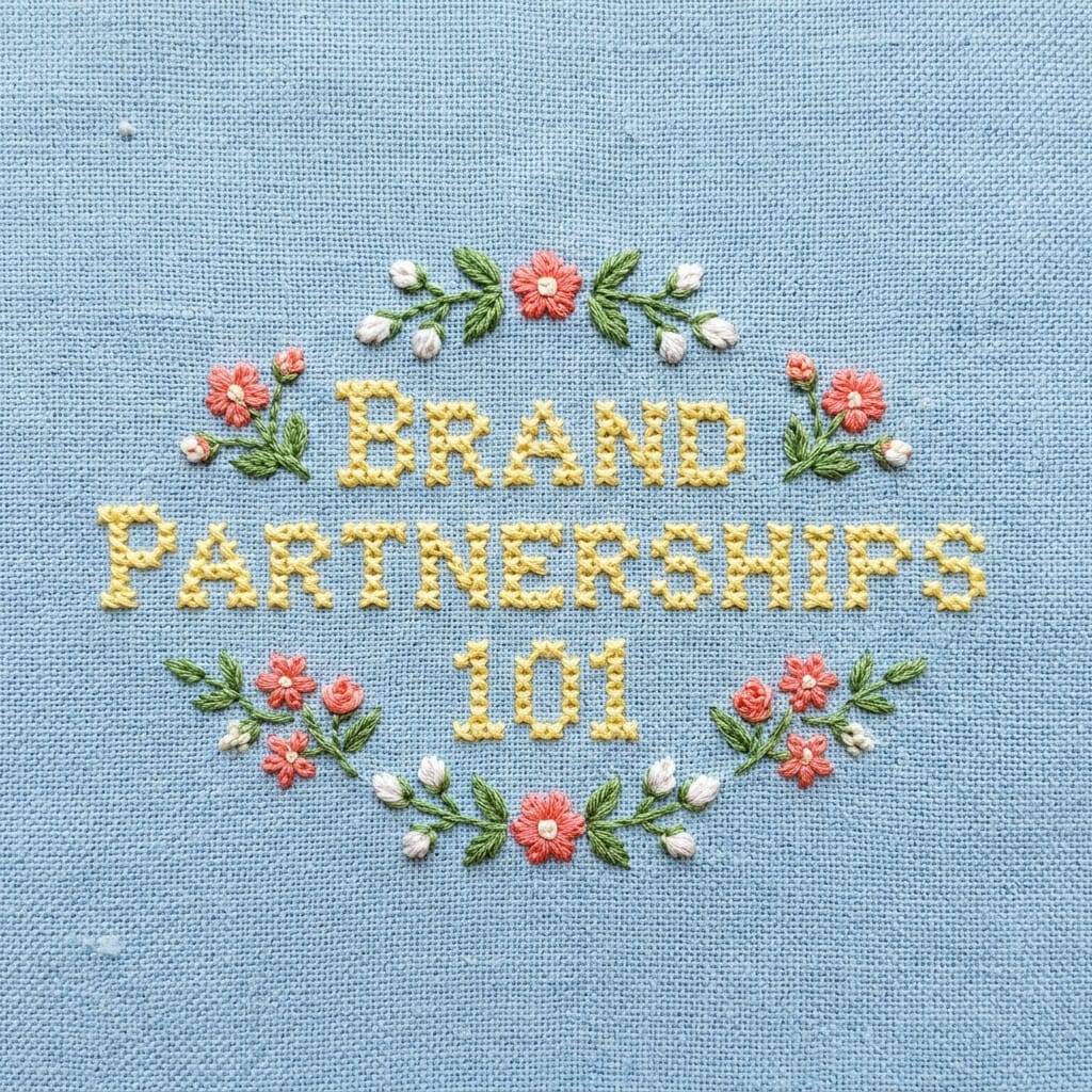 Nano Banana AI image generator artwork featuring embroidered Brand Partnerships 101 text with yellow lettering and floral accents on textured blue fabric.
