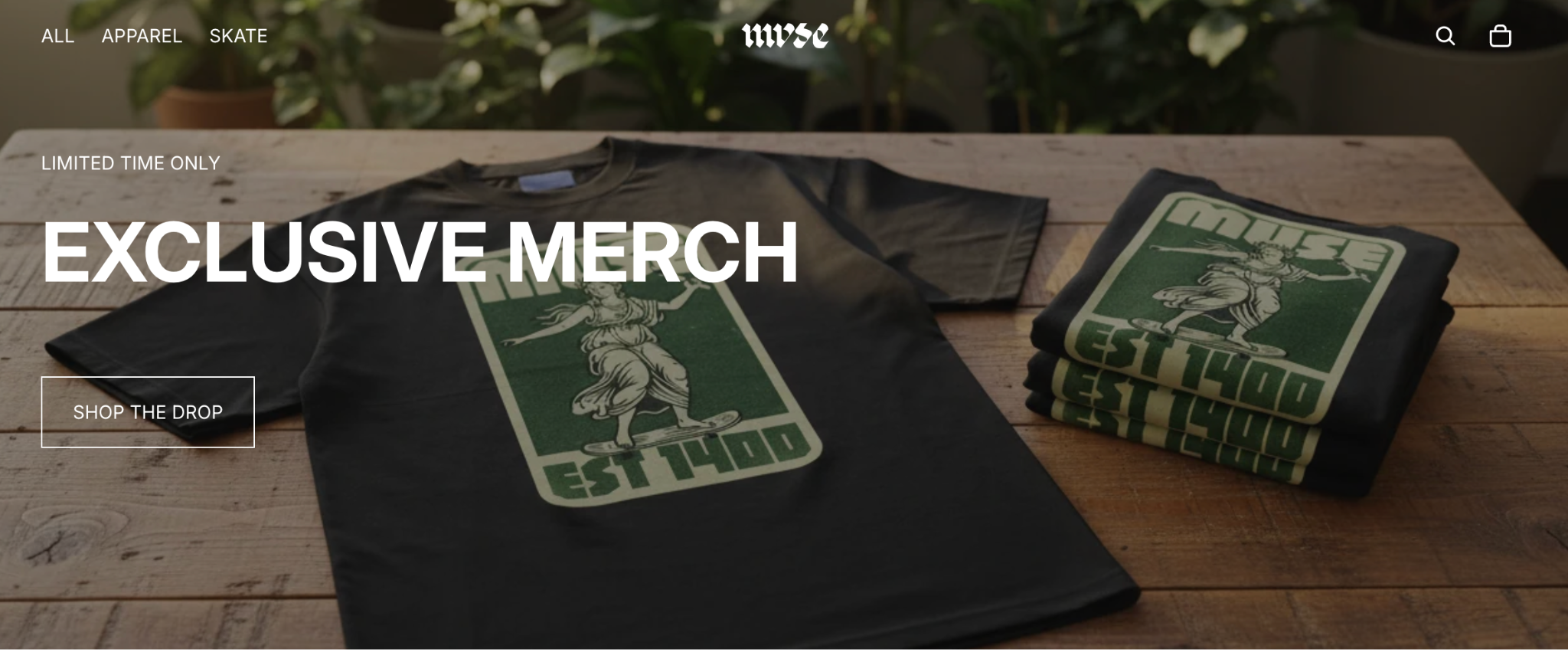 A webpage featuring a t-shirt with the title 'Exclusive Merch' and a button labelled 'Shop the Drop'